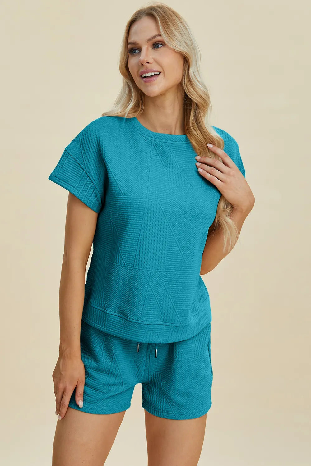 Cerulean crewneck short-sleeve top and high-rise textured drawstring shorts set.