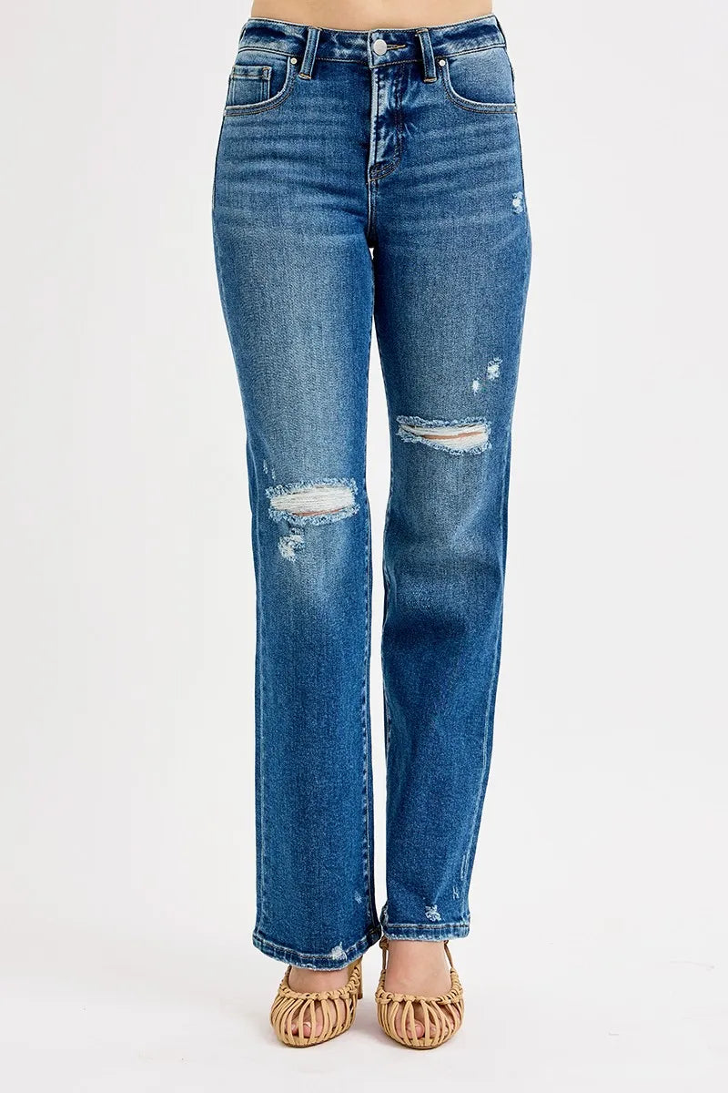 Dark high-rise straight jeans, back pockets, distressed knee rip and frayed hem