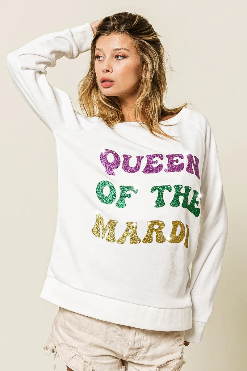 Off-white sweatshirt back with glitter “QUEEN OF TH3 MARDI” text, long sleeves