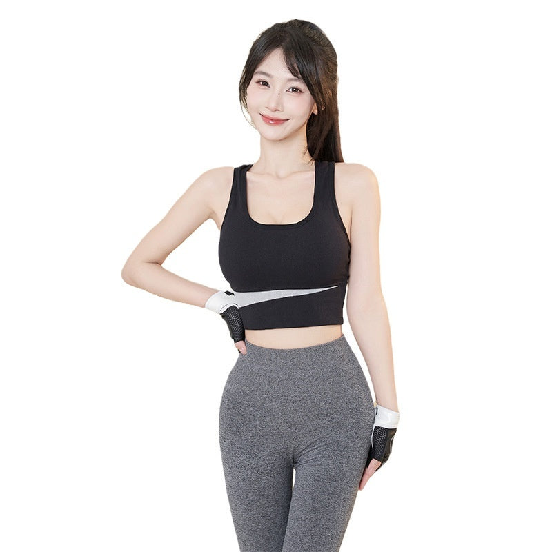Wireless shockproof sports bra vest in black with wide elastic underband and scoop neckline