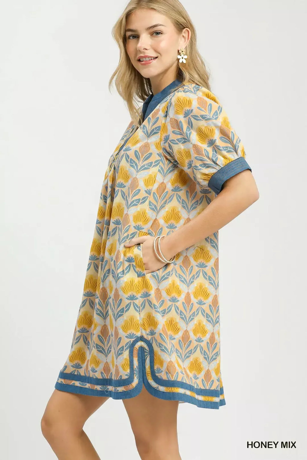 Honey mix mini dress side view with puff sleeves and blue-trimmed hem