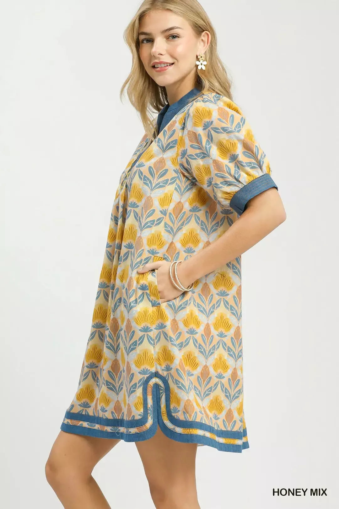 Honey mix mini dress side view with puff sleeves and blue-trimmed hem