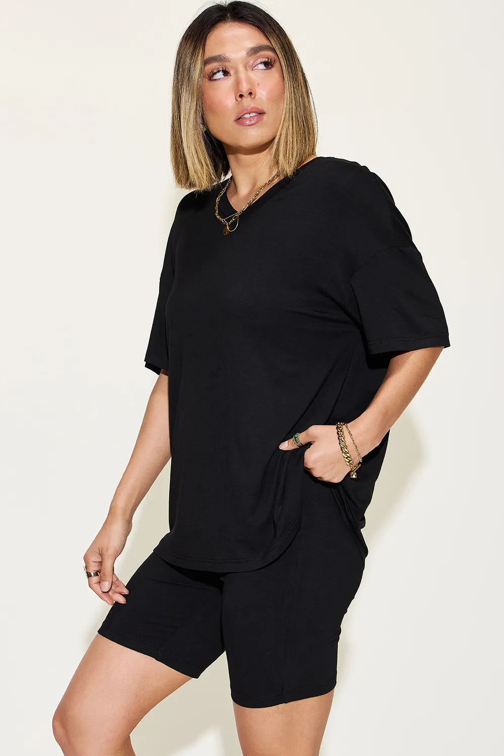 Black V-neck drop-shoulder T-shirt and matching shorts set
