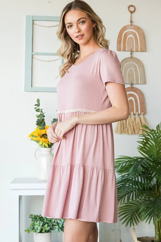 Dusty rose short-sleeve tiered mini dress with pompom lace trim under the bust