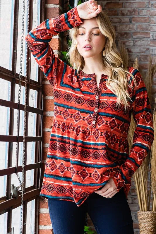 Geometric long-sleeve babydoll blouse with front buttons and curved hem