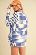 Back view of blue-and-white striped drawstring shorts with contrast trim