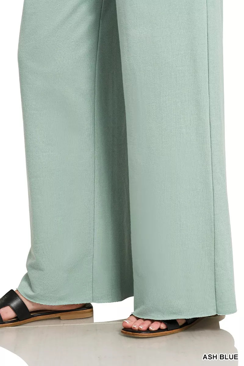 Ash blue wide-leg sweatpants hem with roomy straight leg opening