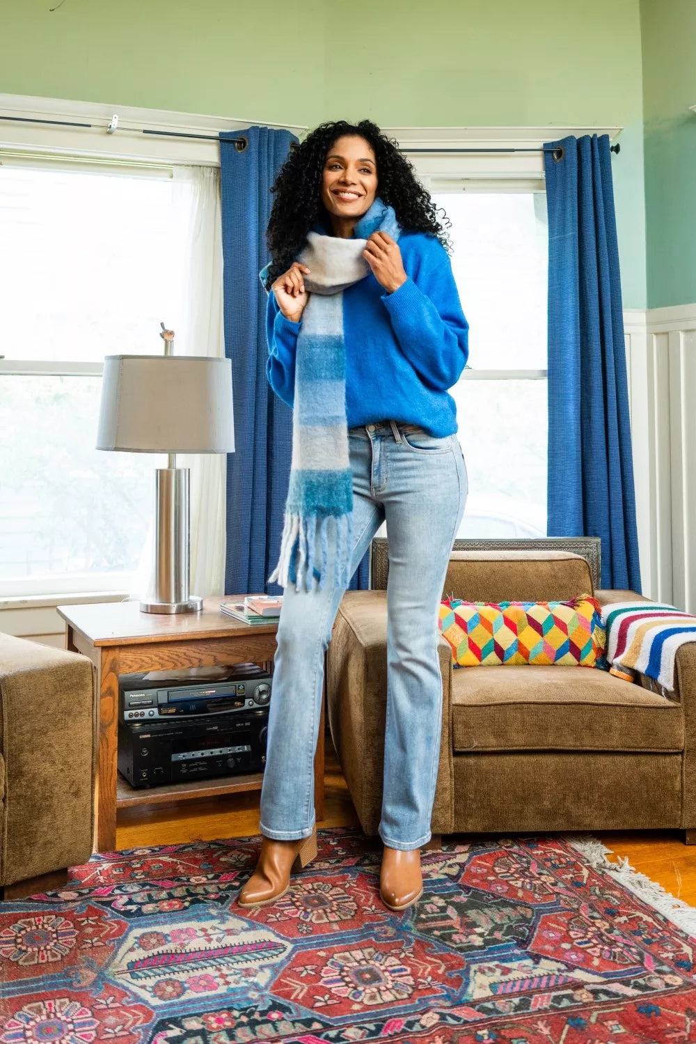 Judy Blue Mid Rise Thermal Bootcut Jeans in light wash, straight-through legs and flare hem