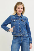 Medium-wash fitted denim jacket with button front, flap pockets, and long sleeves