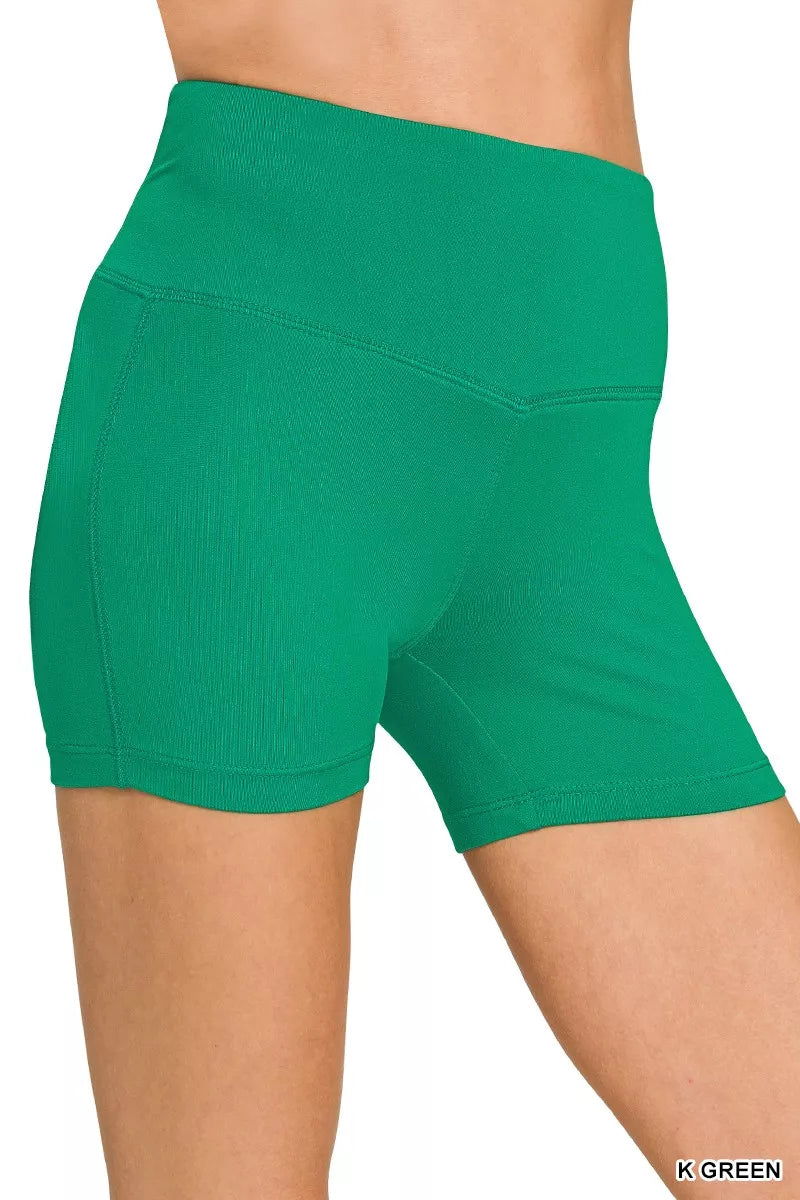 K Green brushed microfiber biker shorts close-up of wide waistband and stitching