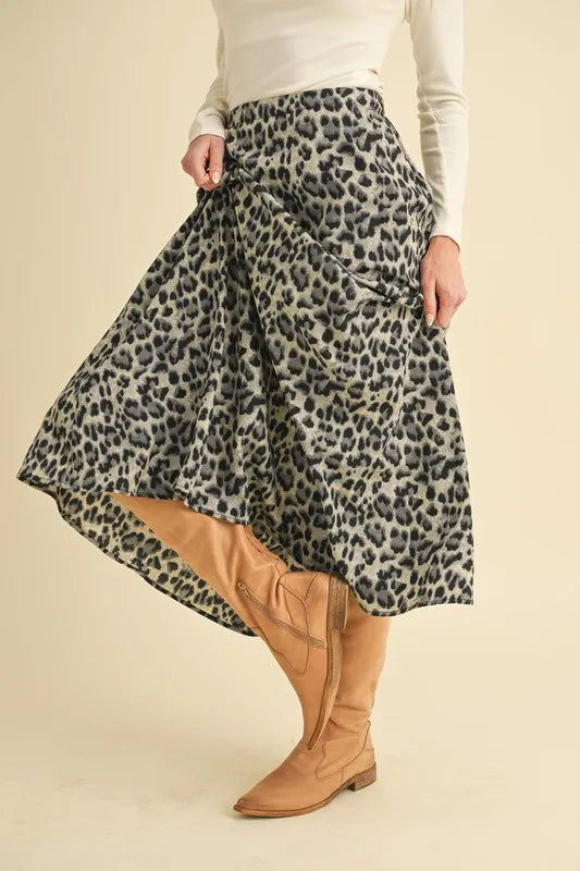 Leopard midi skirt featuring side pockets and gathered waistband
