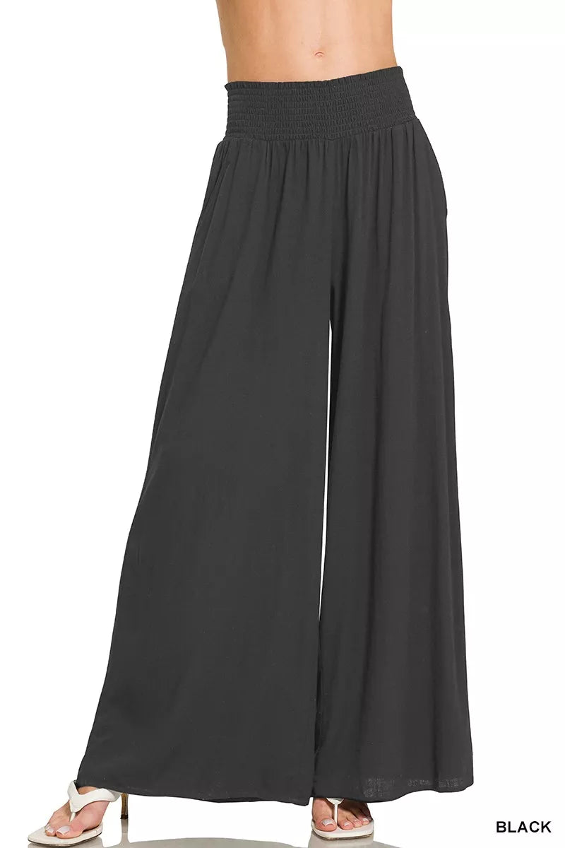 Black smocked-waist wide-leg lounge pants with gathered elastic waistband