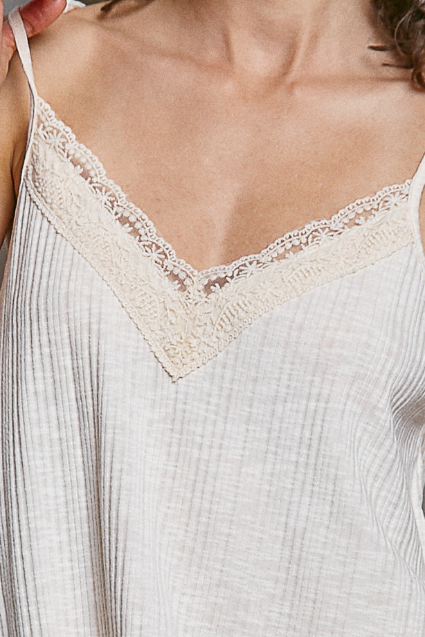 Close-up of lace V-neck and textured knit cami in almond with scalloped trim