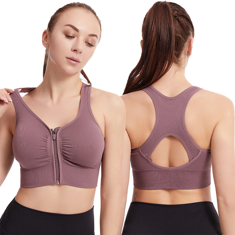 Plus size sports bra with zip front and racerback cutout, mauve/purple color