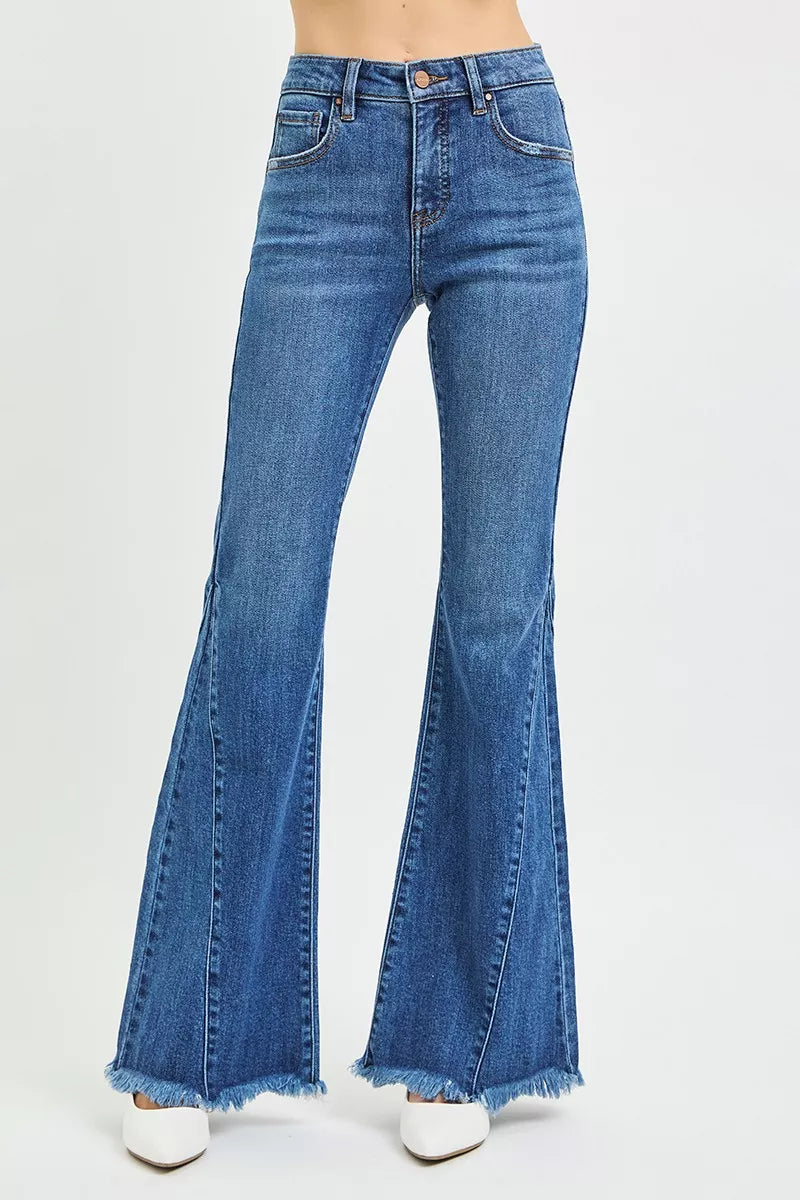 Mid-rise flare jeans in dark blue with side-seam detailing and frayed hem