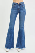 Mid-rise flare jeans in dark blue with side-seam detailing and frayed hem