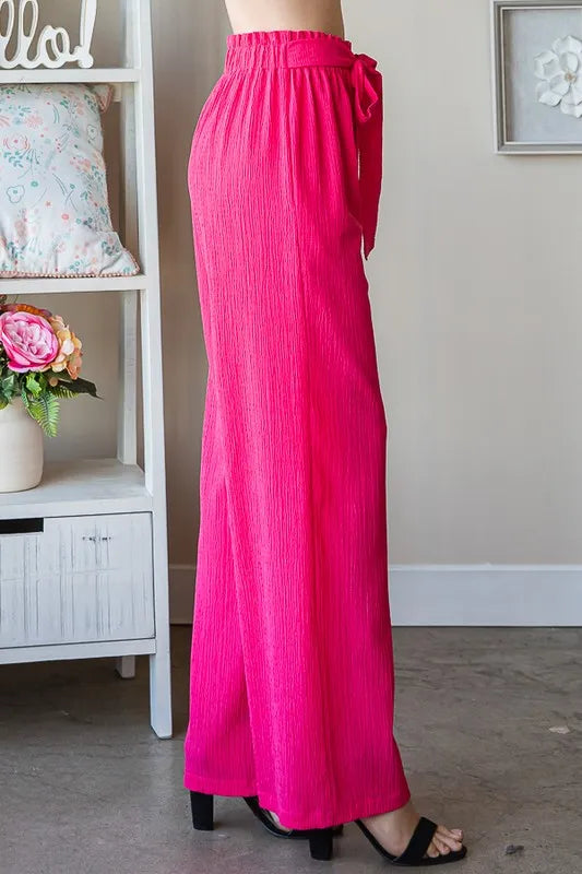 Watermelon paperbag waistband pants, back view, flowing wide-leg fit