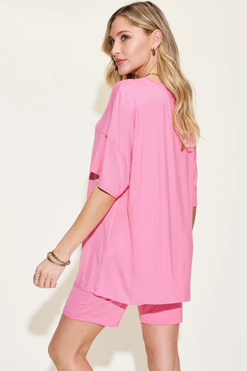 Pink V-neck drop-shoulder T-shirt and matching shorts set, back view