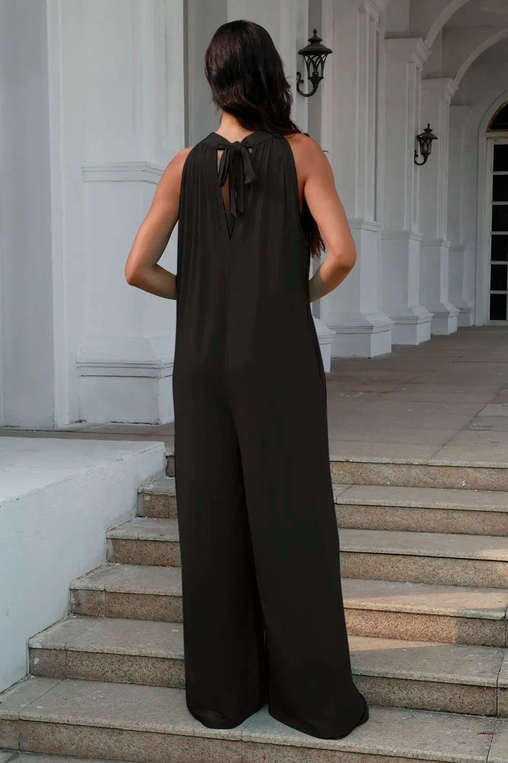 Double Take black sleeveless jumpsuit, open back with tie detail at center