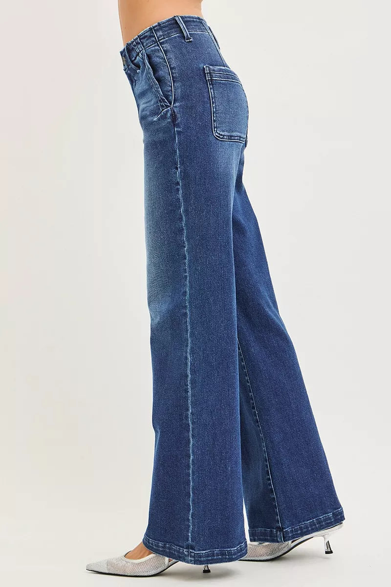 Side view high-rise wide-leg jeans in dark wash denim with slanted pocket