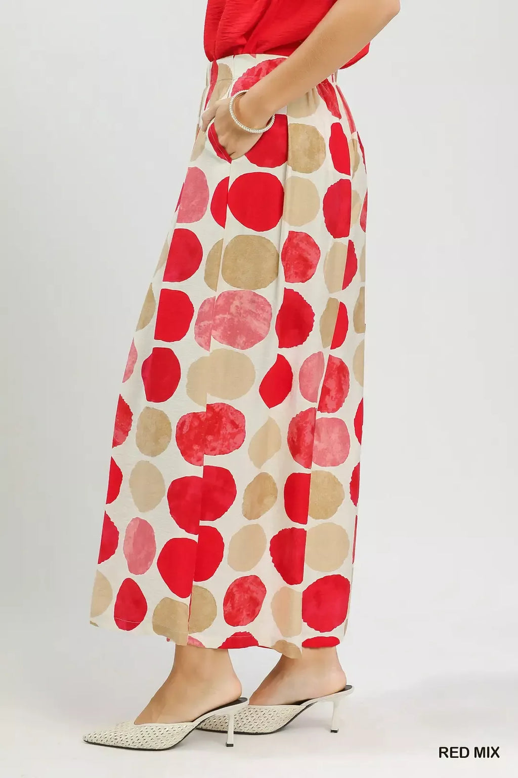 Red mix dot-print wide-leg pants, side view, elastic waistband, drapey full length