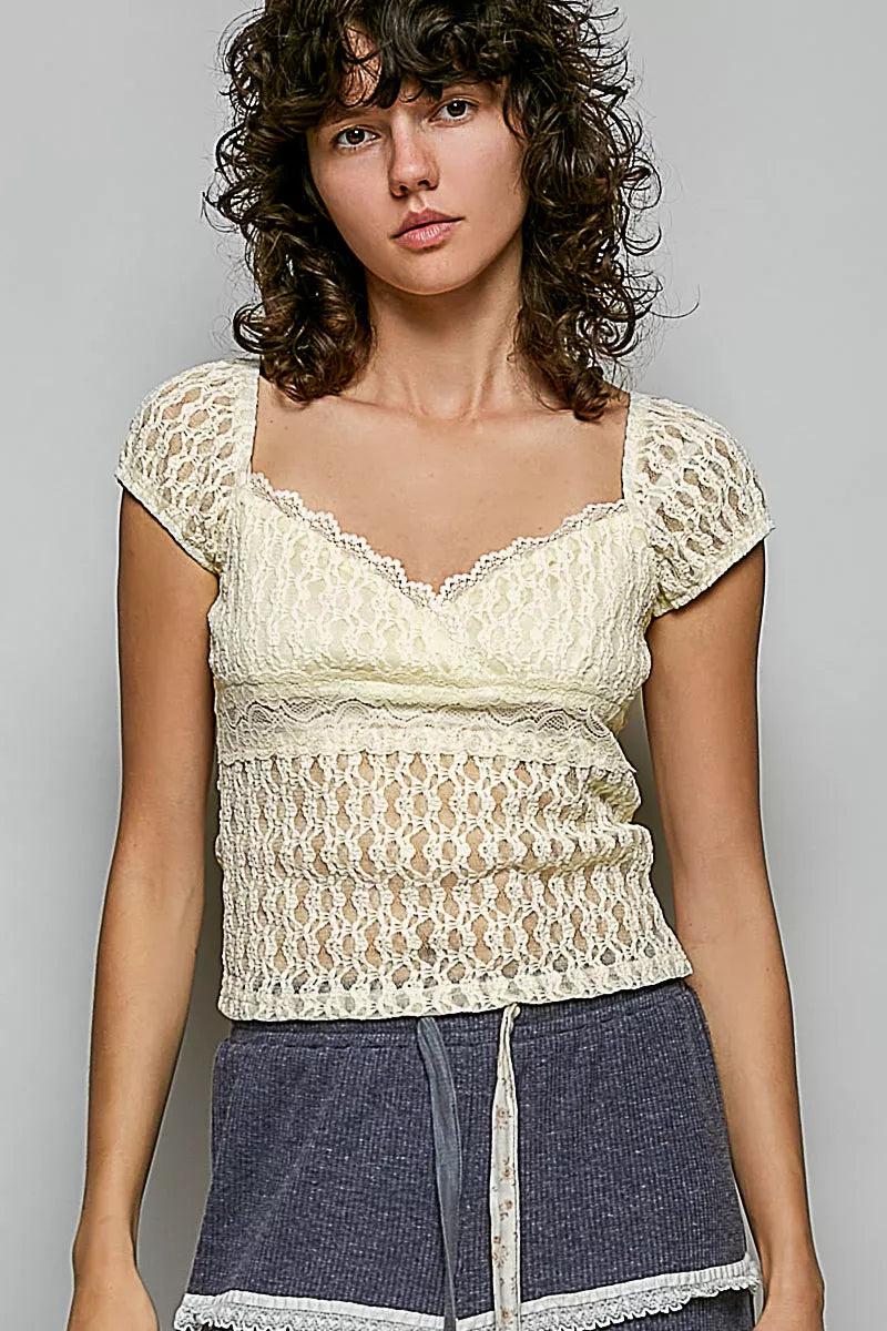 Natural lace sweetheart-neck short-sleeve peplum top with scalloped trim and texture