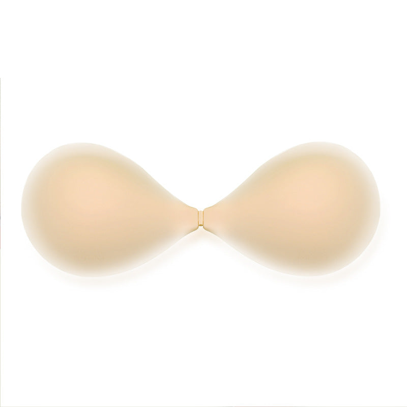 Silicone adhesive bra cups, light nude/cream color with center seam