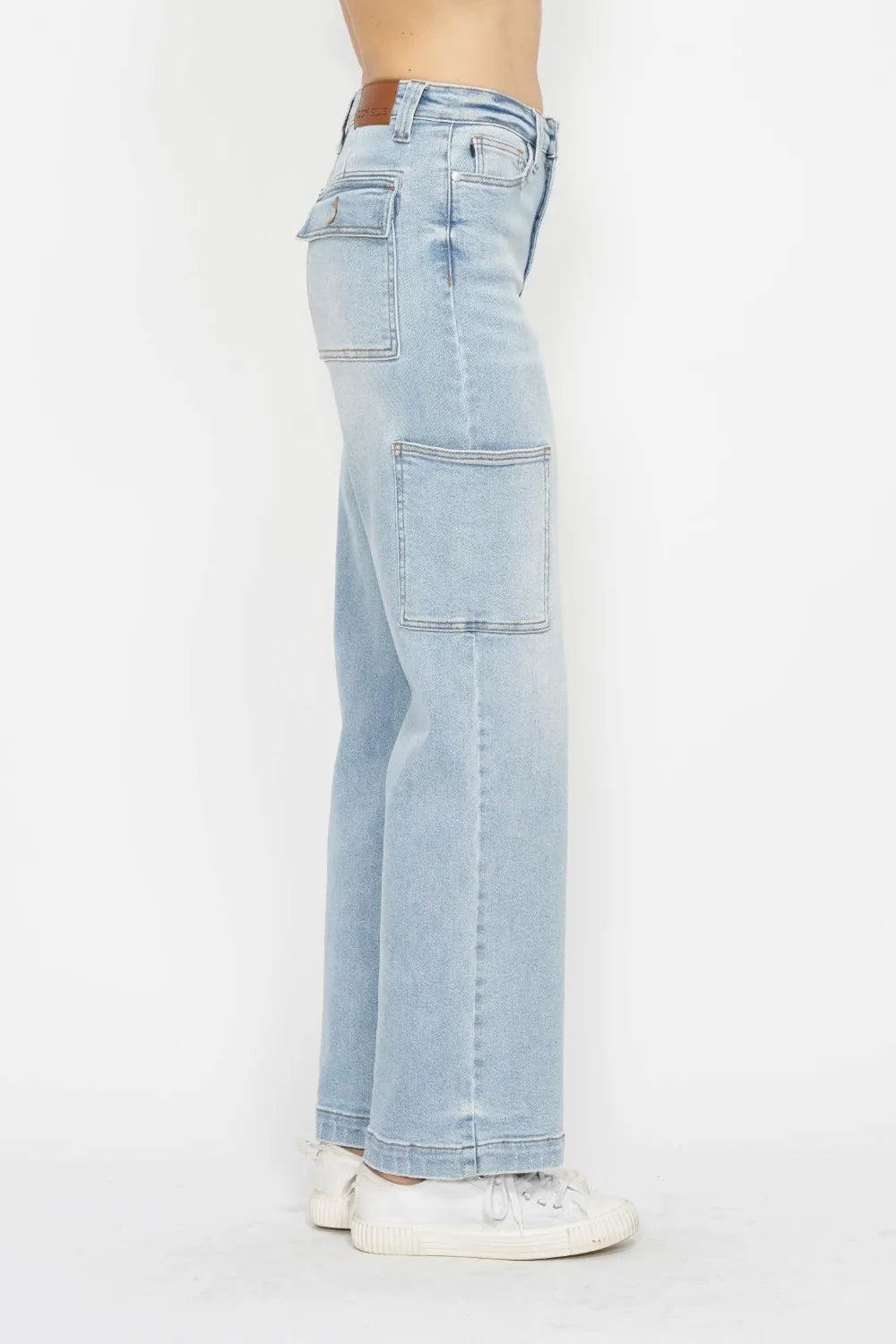 Light blue high-waist straight cargo jeans, rear side view with pocket detail