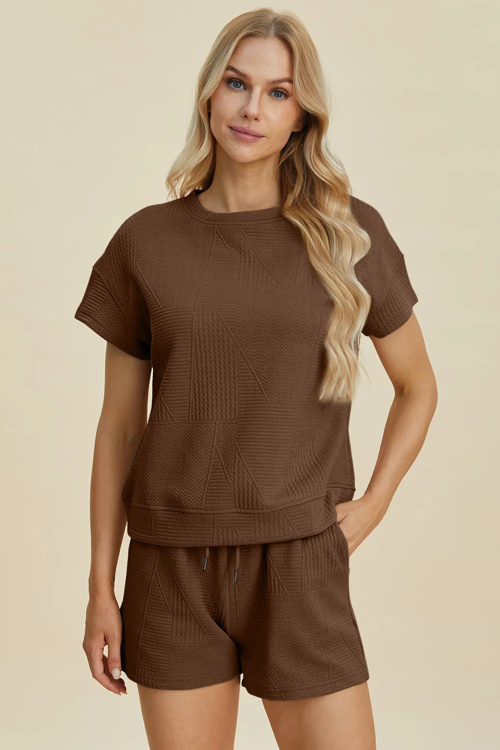 Brown textured short-sleeve top with matching drawstring shorts set.