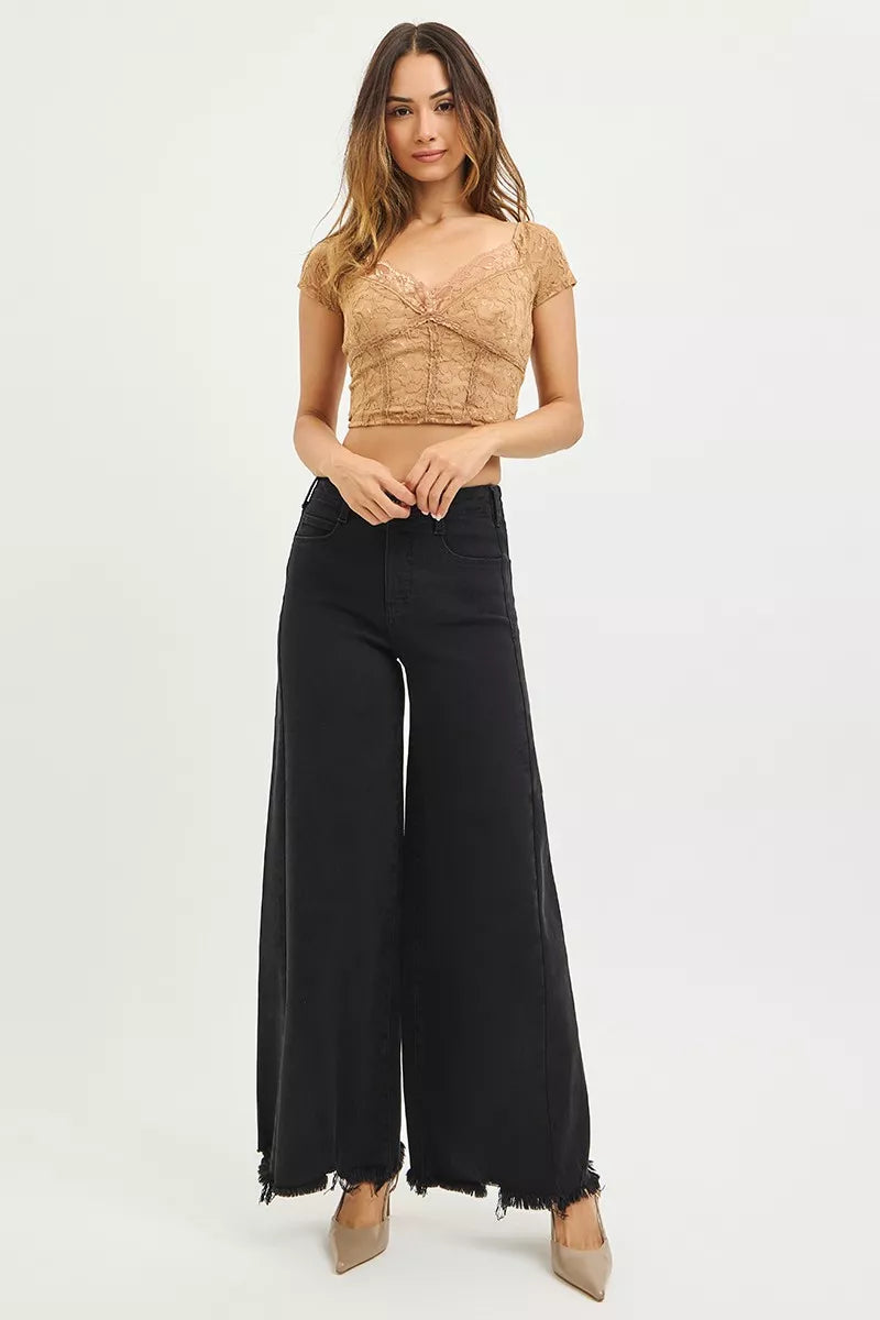 Black palazzo jeans, high rise with frayed hem and wide-leg silhouette