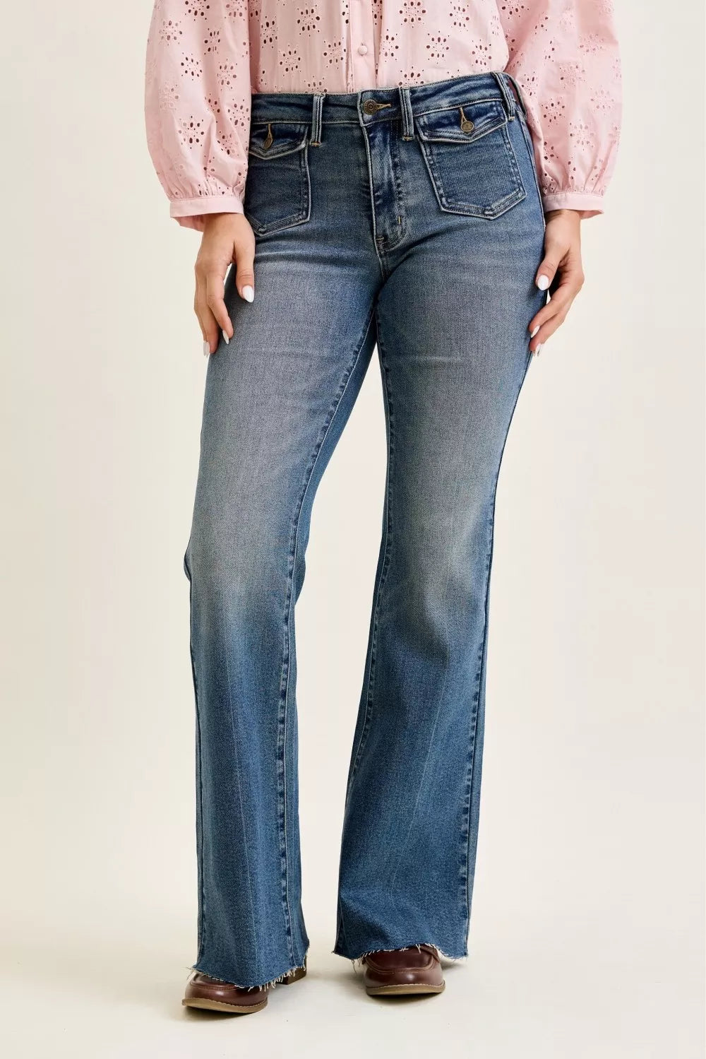 Judy Blue Mid-Rise Flare Jeans with front flap pockets, dark wash denim