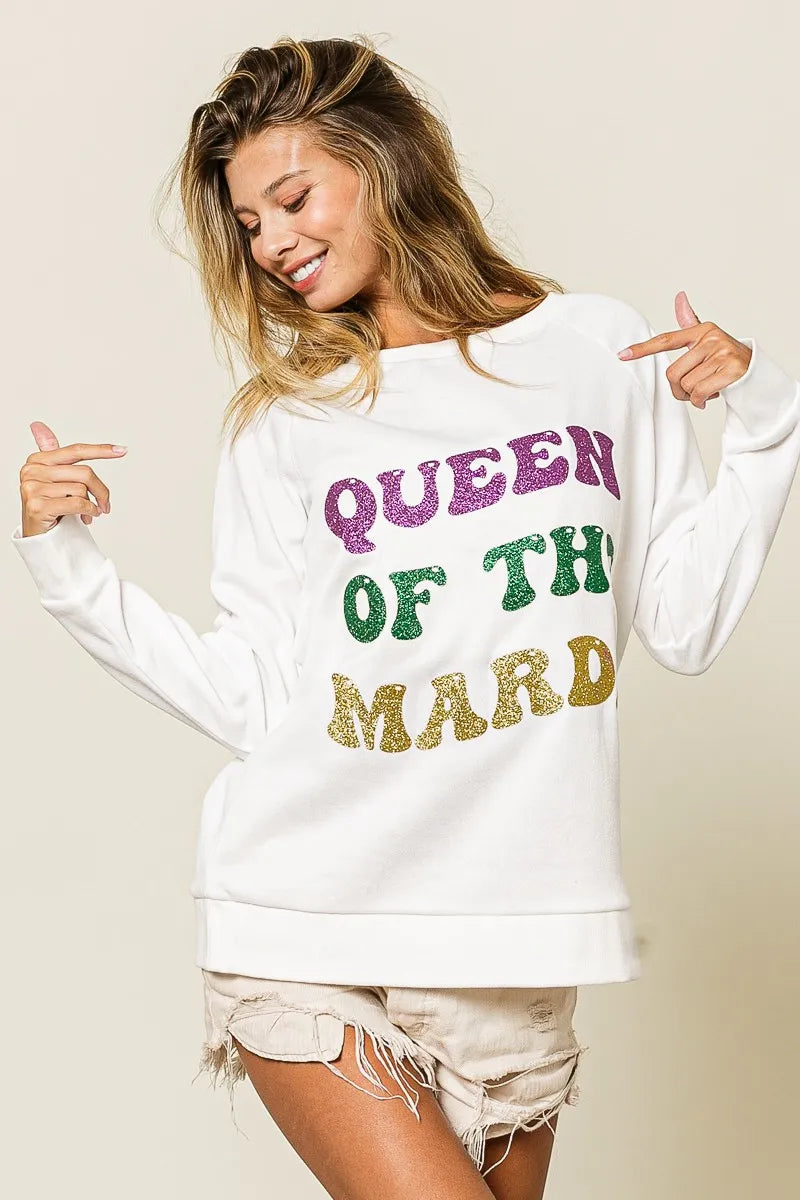 Off-white glitter graphic sweatshirt “QUEEN OF TH3 MARDI”, wide neckline, long sleeves