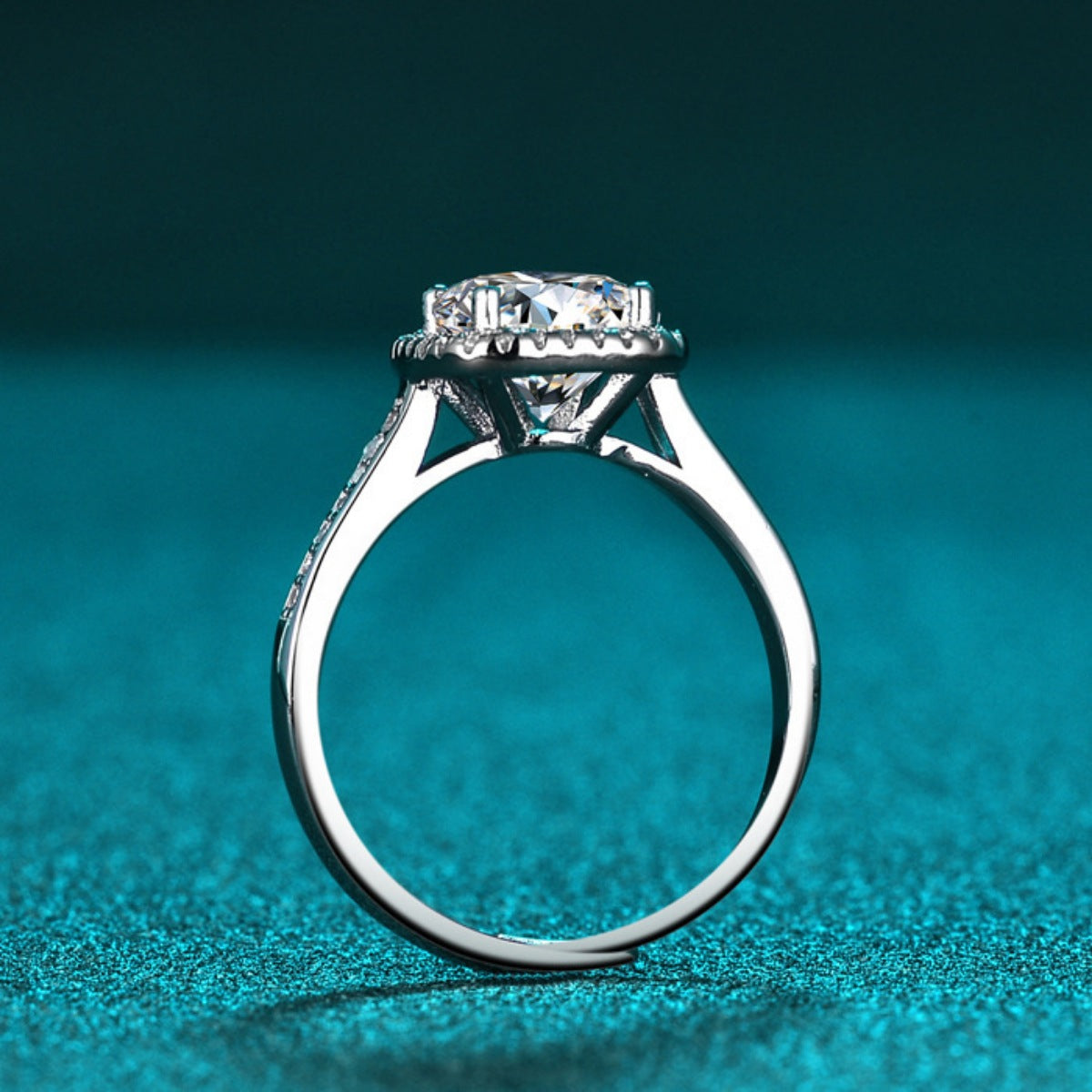 Sterling silver moissanite ring, prong-set cushion center with pavé band