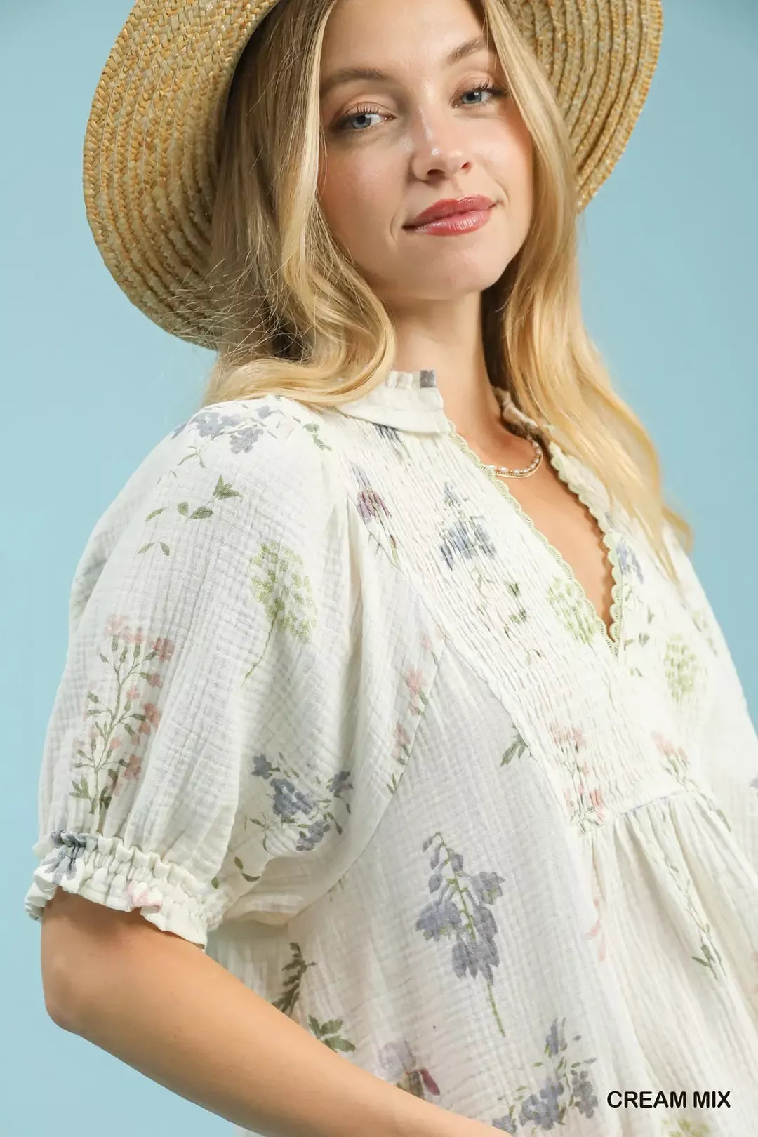 Cream mix floral gauze top close-up with V-neck lace trim and ruffled neckline