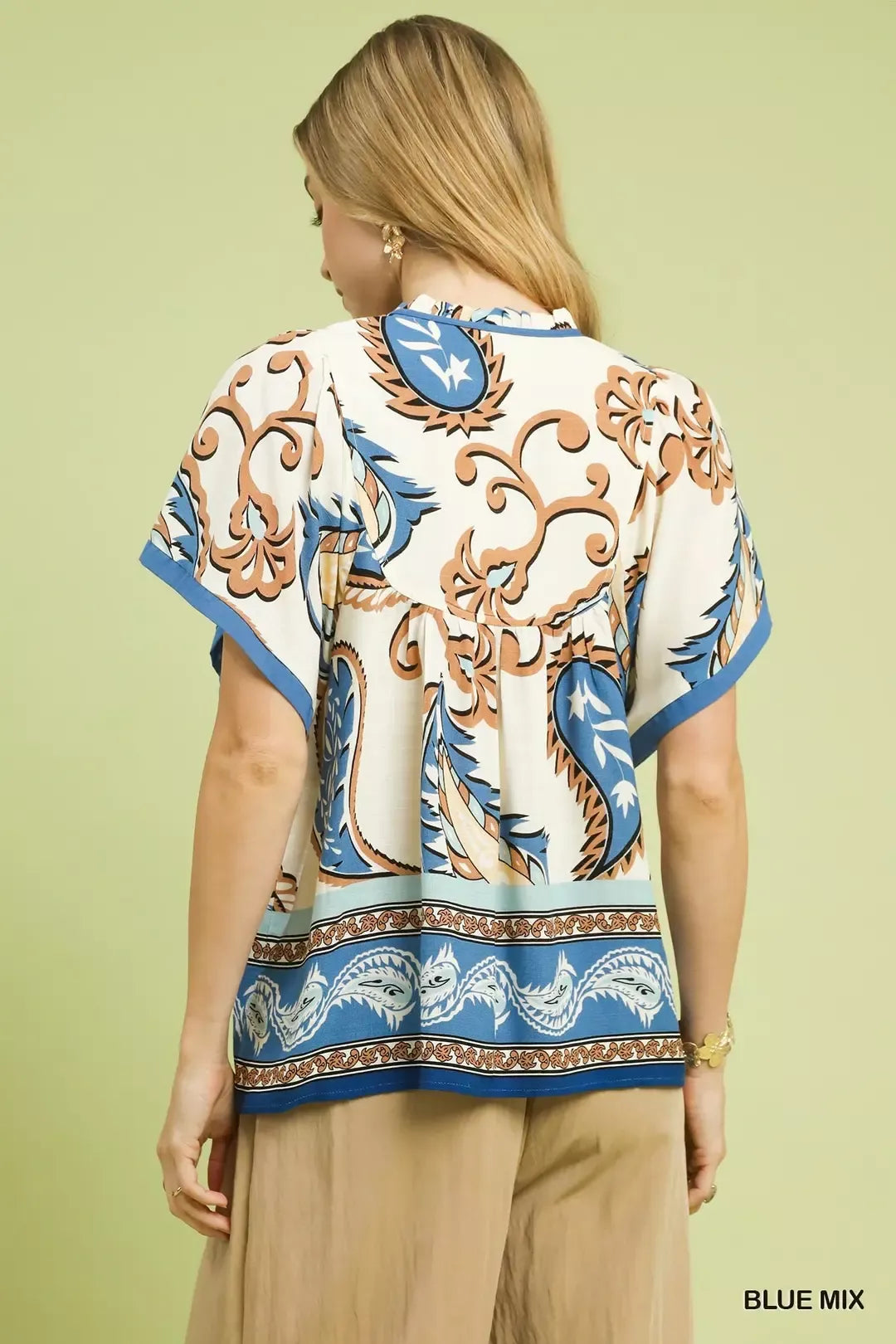 Back view of BLUE MIX paisley border print top with V-neck cut and short sleeves