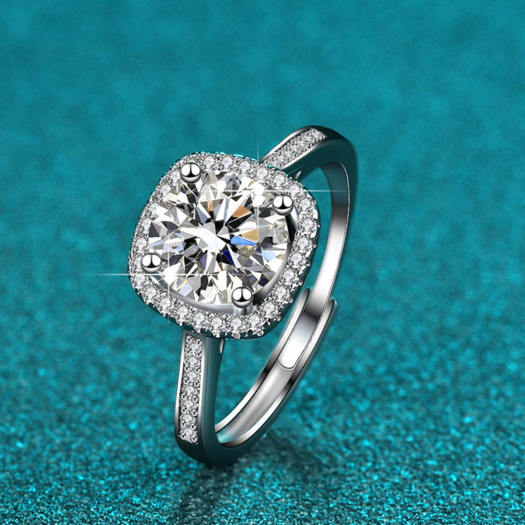 Sterling silver moissanite ring with halo cushion center, pavé accents
