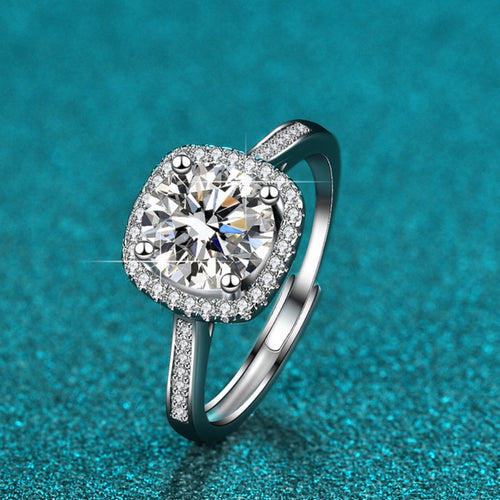 Sterling silver moissanite ring with halo cushion center, pavé accents
