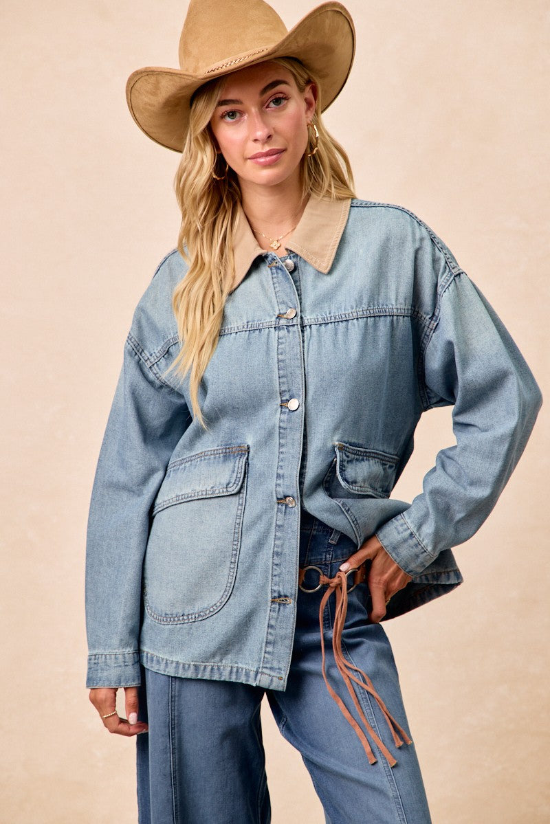 Washed denim jacket with tan contrast collar, two chest pockets, metal buttons