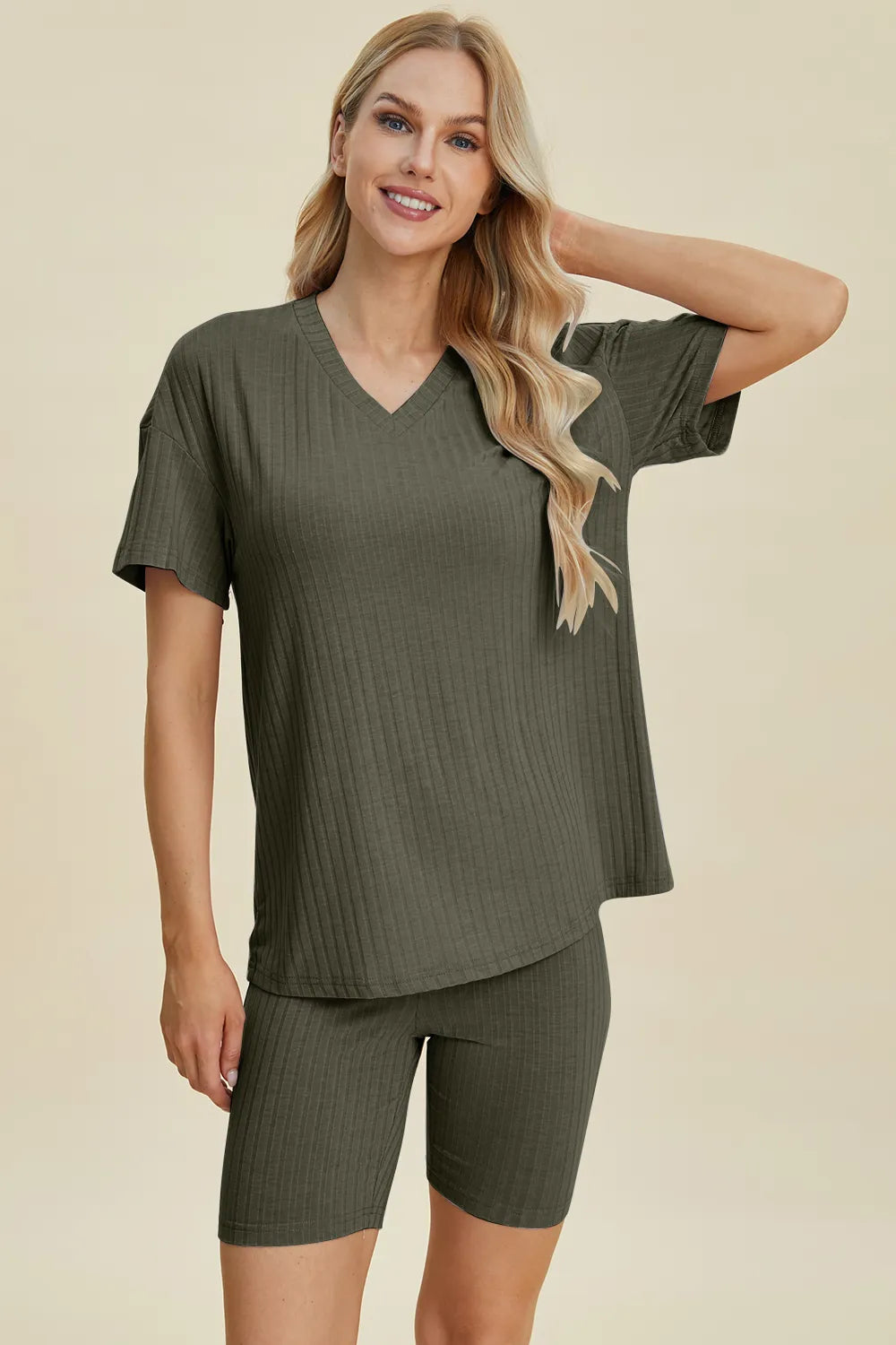 Moss green ribbed V-neck short-sleeve top and matching biker shorts set, side view