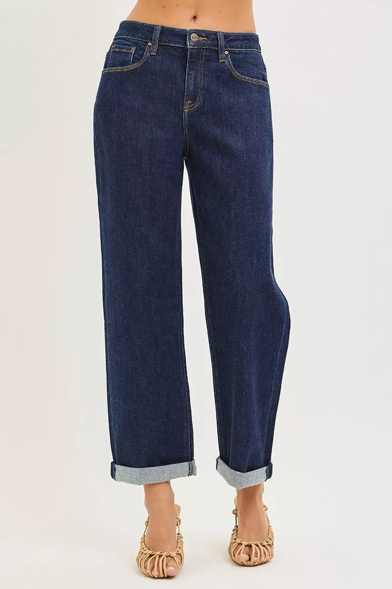 Dark blue slouchy cropped boyfriend jeans with cuffed hems, front view
