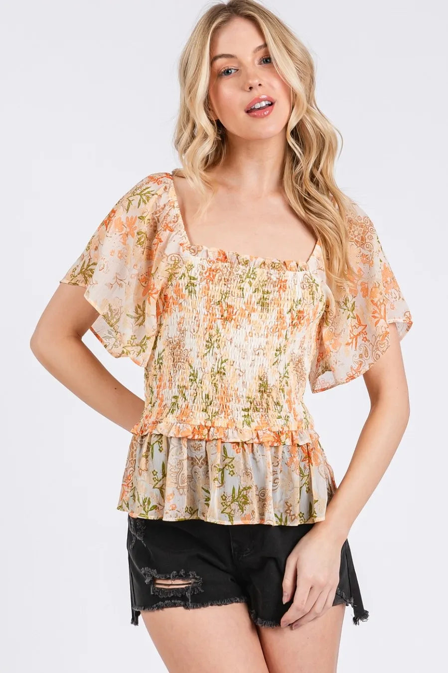 Orange floral chiffon peplum top with smocked square neckline and ruffled waist