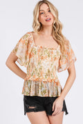 Orange floral chiffon peplum top with smocked square neckline and ruffled waist