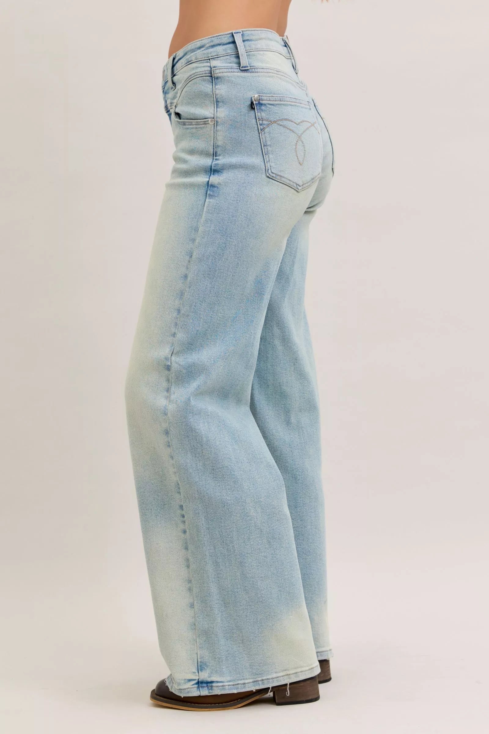 Light blue high-waist straight jeans, back view with back yoke seam and two back pockets
