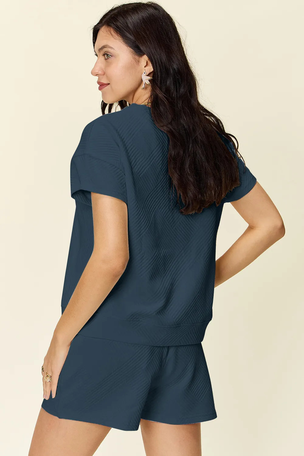 Deep blue textured short-sleeve T-shirt and drawstring shorts set, angled view