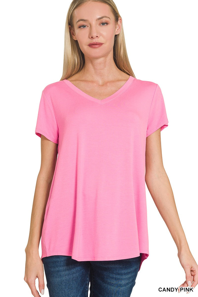 Candy pink V-neck tee with short sleeves and curved rounded hem