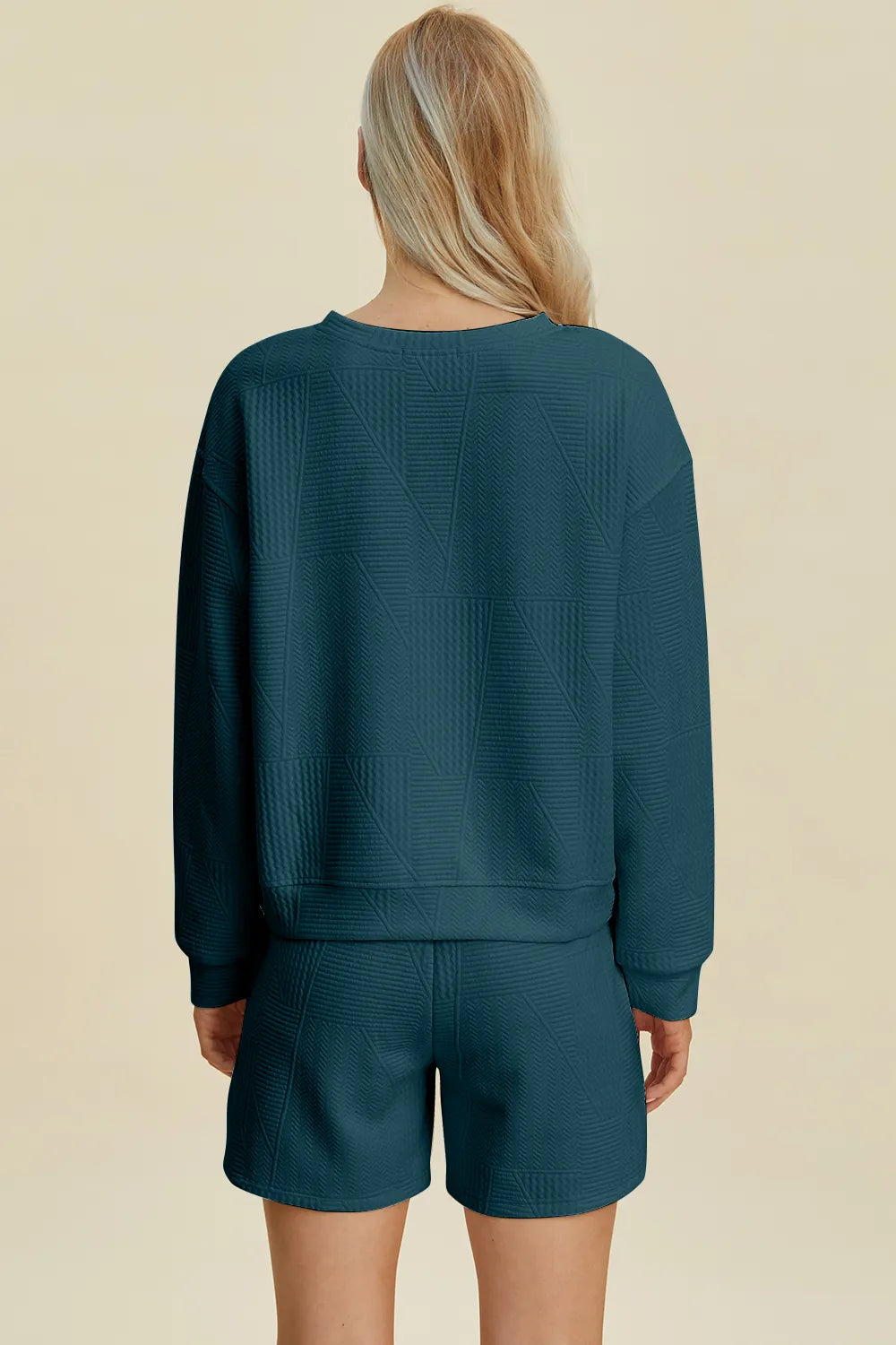 Peacock blue textured long-sleeve top and shorts set, back view.