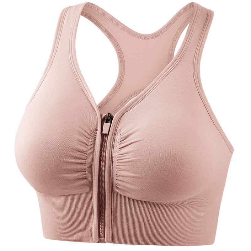 Plus size sports bra with zip front, racerback cutout, blush pink color