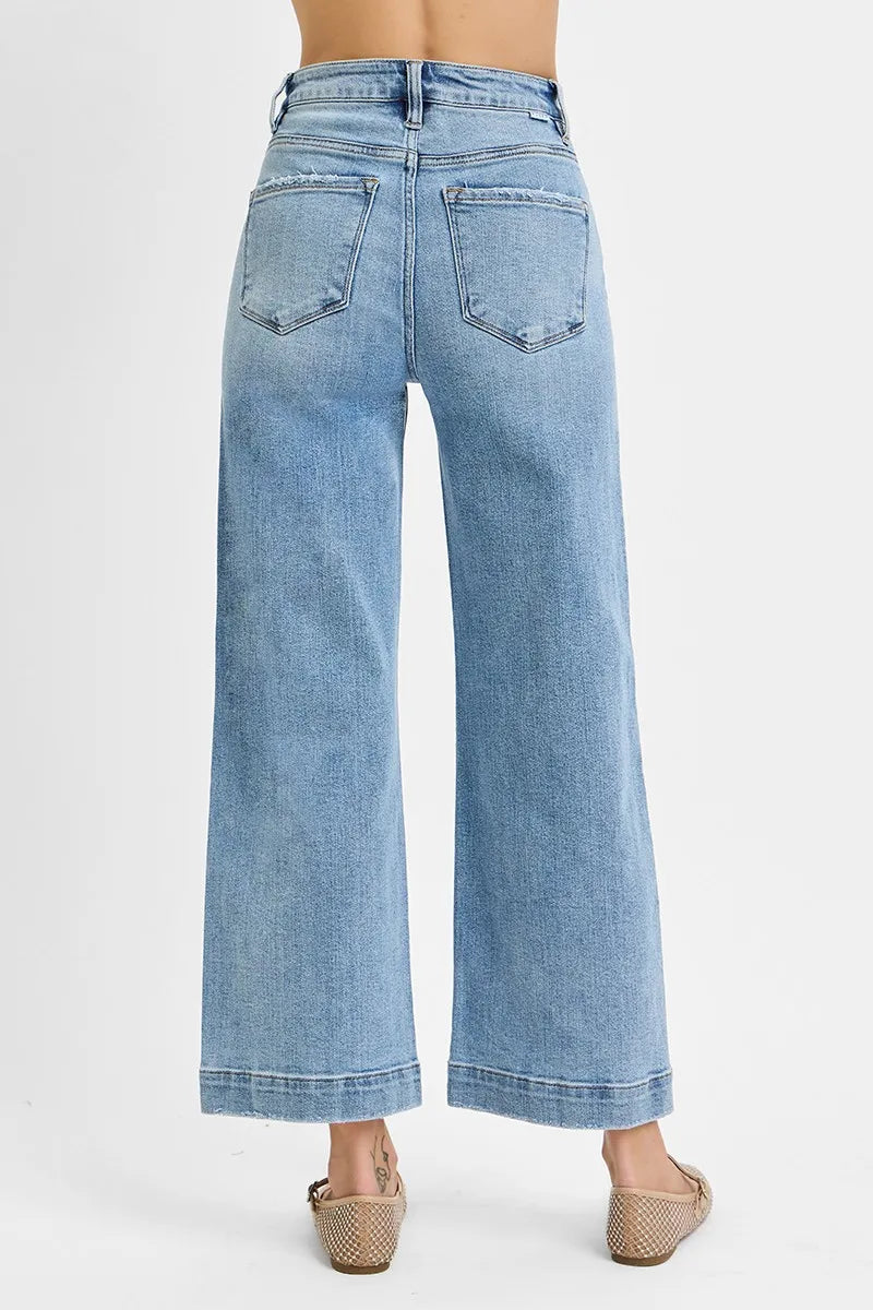Light-wash crop wide-leg jeans back view, two rear pockets and high-rise waistband