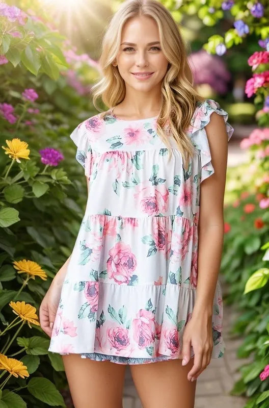 Cream floral tiered short-sleeve top with ruffled sleeves and round neckline