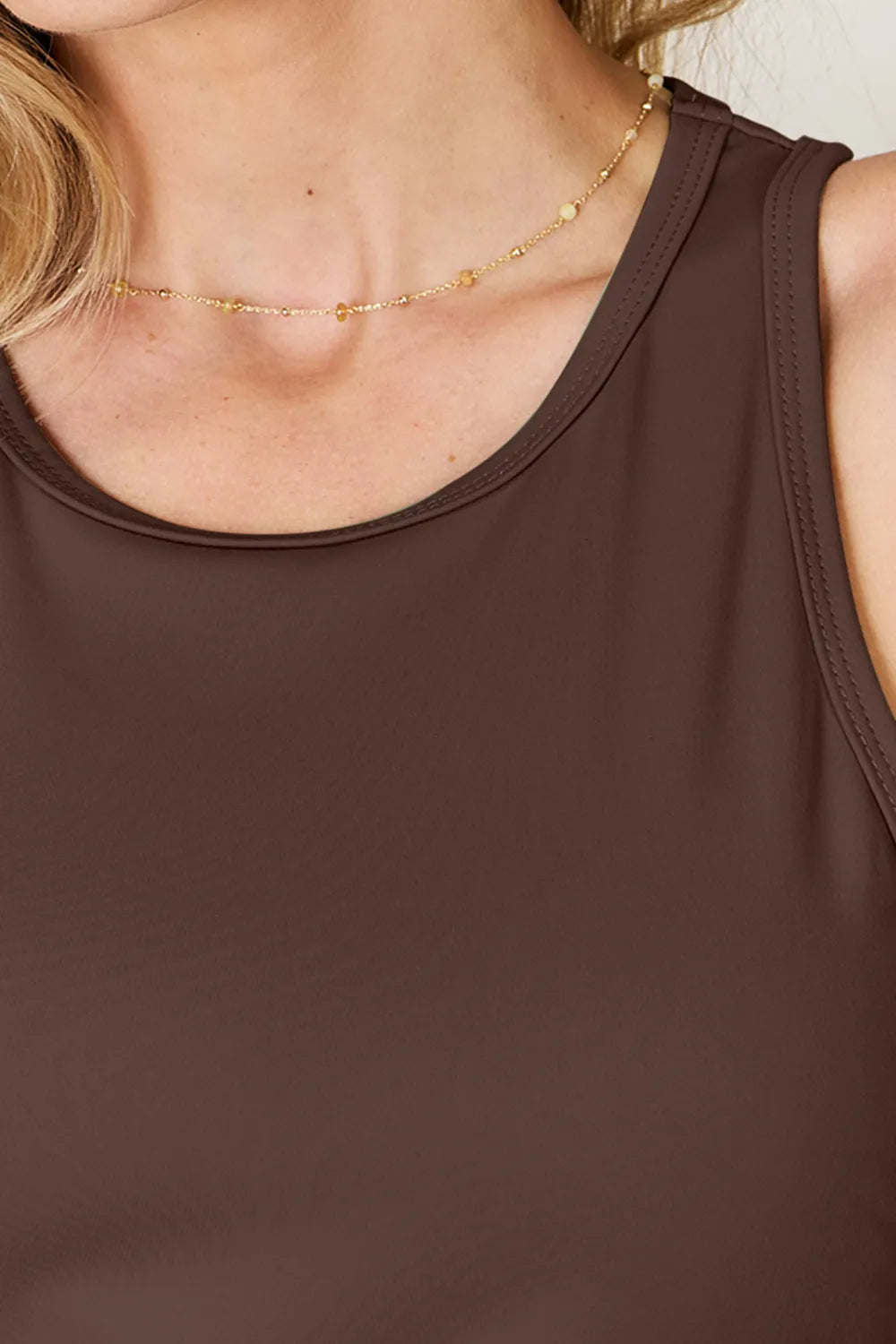 Chocolate brown sleeveless tank with round neck close-up
